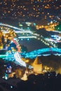 Tbilisi, Georgia. Abstract Blurred Bokeh Urban Backdrop Of Sioni Cathedral And Bridge Of Peace At Evening Night Street Royalty Free Stock Photo