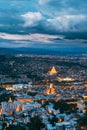 Tbilisi Georgia. Aerial Scenic Cityscape View In Evening Illimination,