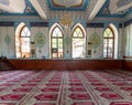 TBILISI, GEORGIA - August 06, 2015: The interior of Jumah Friday Mosque, decorated with arabic inscriptions from Quran and flora Royalty Free Stock Photo