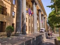 Tbilisi, Georgia - 07 23 2022: The Biltmore Hotel Tbilisi building on Shota Rustaveli Avenue with armored van of