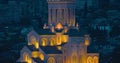 Tbilisi, Georgia. Cityscape View Of Capital In Evening Illumination Sameba Holy Trinity Cathedral. Famous Landmarks In