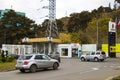 Socar petrol station, garage and market. Cars and autos on the road