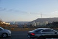 Tbilisi, Georgia - February 14th 2022 - Cars passing by on the bridge in capital of Georgia