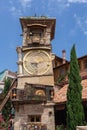 TBILISI, GEORGIA - July 27, 2014: Falling Clock tower of puppet theater Rezo Gabriadze in old town of Tbilisi