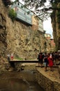 Tbilisi, Georgia - June 19, 2016: Tourists in Leghvtakhevi gorge, separating the ancient Kala district from the main city. It is