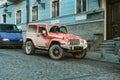 Tbilisi, Georgia - March 28, 2022: View Of Red Jeep Wrangler Overland Edition Parked By Street Of Tbilisi, Georgia