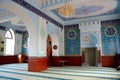 Interior prayer area with blue calligraphy mihrab columns Jumah Central Mosque Tbilisi Georgia