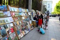 Outdoor street side book stall with customers Tbilisi Georgia