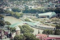 TBILISI, GEORGIA - MAY 07, 2016: People in apark in front of Con