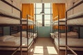 Light in window of hostel bedroom with clean white bunk beds for students and tourists Royalty Free Stock Photo