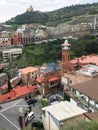 Juma mosque minaret and Tabor Monastery in Tbilisi Royalty Free Stock Photo