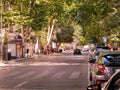 Tbilisi, Georgia - 07 23 2022: Summer time view along Davit Aghmashenebeli Avenue in Downtown Tbilisi with lush green