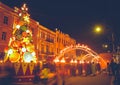 : street view crowds of people with children on xmas market on Christmas day. Celebrations