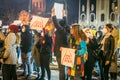 Hundred years anniversary event on Tbilisi. Young protestors stands with posters