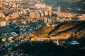 Tbilisi Georgia. Residential Quarters time . time elevated view Cityscape Famous Landmarks: Kartlis Deda Georgia mother