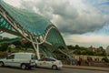 TBILISI, GEORGIA: View over the modern glass Peace bridge. Royalty Free Stock Photo