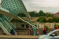 TBILISI, GEORGIA: View over the modern glass Peace bridge. Royalty Free Stock Photo