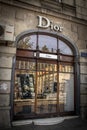 Tbilisi Georgia - Window of Dior store with reflections and view of counter and shelves inside