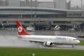 TC-JFE - Turkish Airlines touchdowns at zurich airport under heavy rain Royalty Free Stock Photo