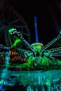 THRILL RIDES WITH COLORFUL LIGHTS Royalty Free Stock Photo