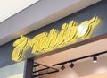 Tchibo storefront neon sign in modern shopping mall Royalty Free Stock Photo