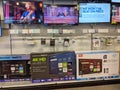 TCL, Sharp, and Insignia Roku TVs on display at Best Buy