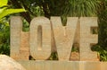 TCloseup of letters alphabets word love carved out of stone