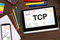 TCP. Transmission Control Protocol the inscription on the touch-screen tablet