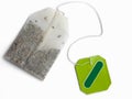 Tea bag with blank green label Royalty Free Stock Photo