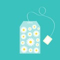 Tea bag herbal chamomile daisy camomile flower set inside. Teabag packaging with label icon. Top wiew. Flat design. Isolated. Royalty Free Stock Photo