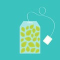 Tea bag herbal mint leaf set inside. Teabag packaging with label icon. Top wiew. Flat design. Isolated. Green background