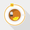 A tea bag with lemon is brewed in a cup Royalty Free Stock Photo