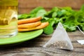 Tea bag? mint, cookie and cup of tea Royalty Free Stock Photo