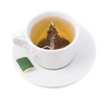 Tea bag in a white cup on a Royalty Free Stock Photo