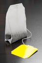 Tea bag with yellow label