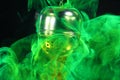 A tea ball with fluorescein in water