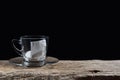 Tea bug on a cup with sugar. Dark background Royalty Free Stock Photo