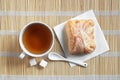 Tea and bun of puff pastry Royalty Free Stock Photo