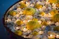 Tea candle lamps and flowers at Hindu Wedding