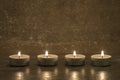 Tea candles on concrete Royalty Free Stock Photo