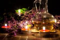 Tea candles, oil and lavender Royalty Free Stock Photo