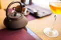 Tea ceremony concept. Tea pot on table in cafe close up. Holiday time, travelling abroad Royalty Free Stock Photo