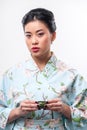 Tea ceremony conducted by Asian woman