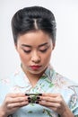 Tea ceremony conducted by Asian woman