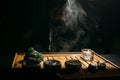 Tea ceremony. The man pours hot chinese tea into the tea cup Royalty Free Stock Photo