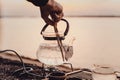 Tea ceremony on the river bank Royalty Free Stock Photo