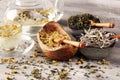 Tea with Chamomile, sage and stinging nettle tea. Dried chamomile tea on table