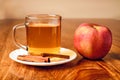 Tea and cinnamon stick and apple Royalty Free Stock Photo