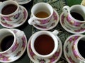 Tea and coffee cups lined up after use Royalty Free Stock Photo