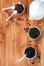 Tea composition. Assortment of dry tea green oolong, black and fruit. Selective focus. Top view